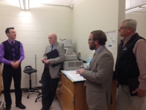 Director Aaron MacLeod discusses the Center with ESD Regional Director Ken Tompkins and ESD staff Christian Mercurio, while Otsego Now CEO Sandy Mathes looks on.
